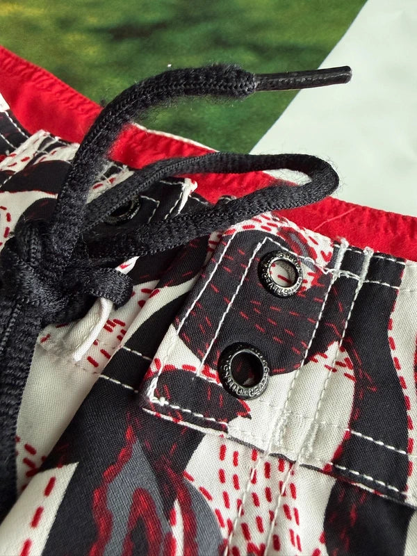 Rare Y2K Quiksikver Fire Tribal Boardshorts