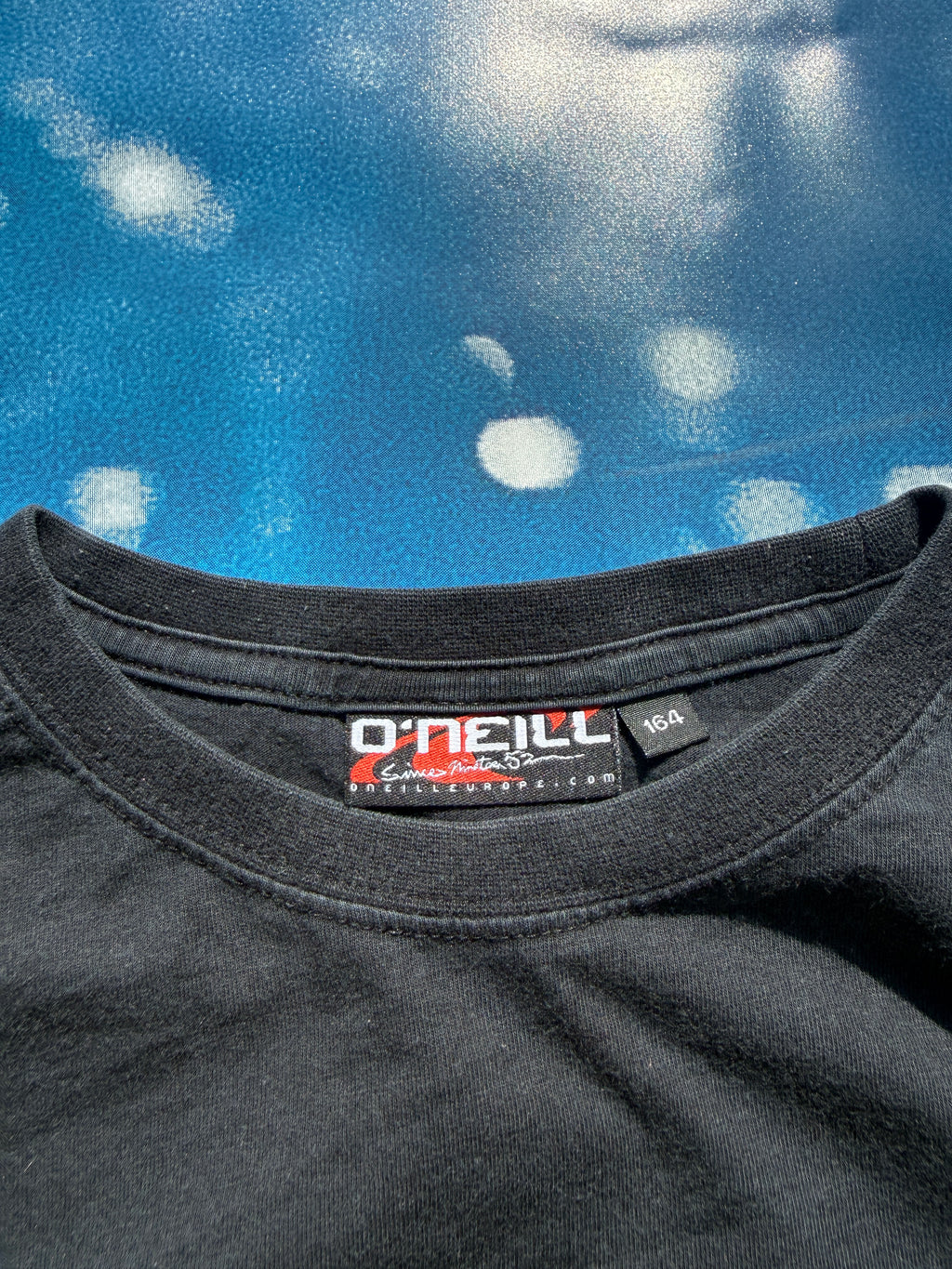 *Grail* O’Neill Flame Tee